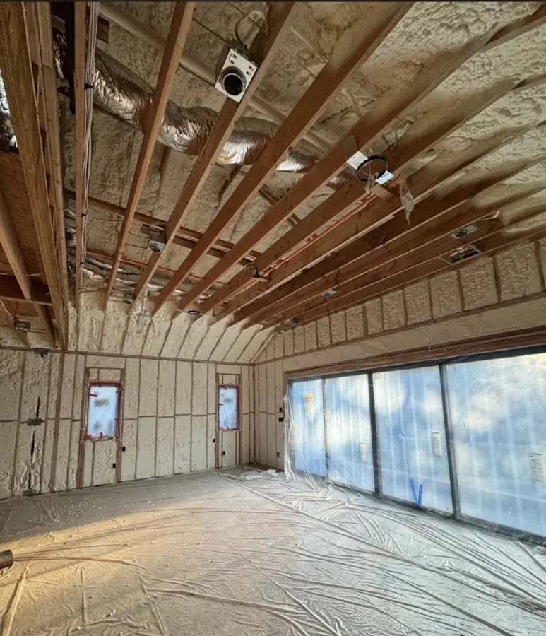 Interior walls and ceiling insulated with spray foam during new construction in Ridgefield